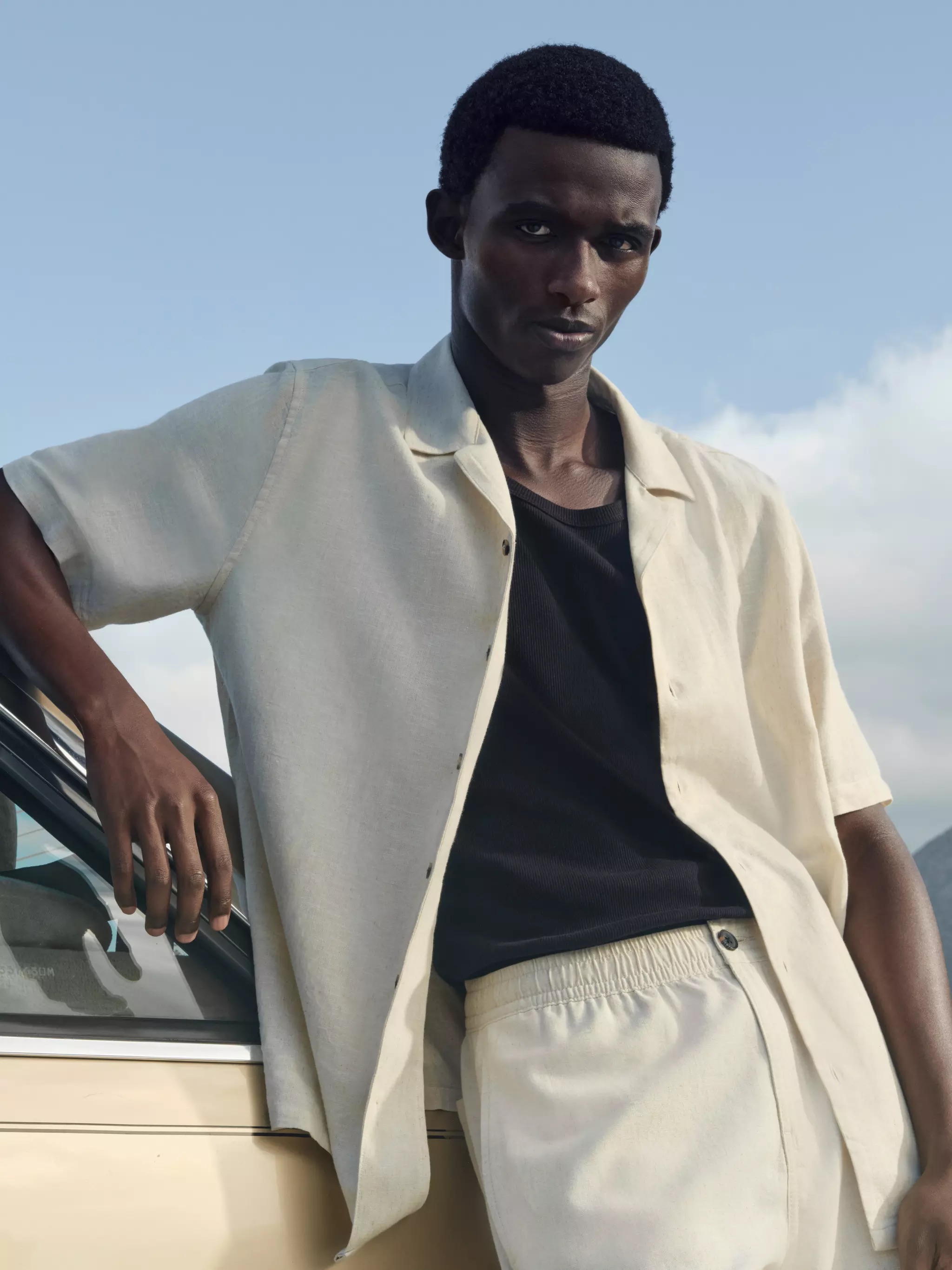 Young man wearing Button-Up Short Sleeve Shirt